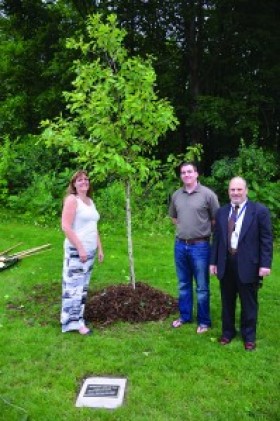 Plymouth Beyond the Yellow Ribbon co-sponsored the addition of this American Dream Oak to be a living part of the Plymouth Veterans Memorial, which was dedicated June 29 at City Hall. Pictured are (from left) PBYR Vice Chair Sylvia Grismer, PBYR Treasurer Allan Crew and PBYR Chair Gary Goldetsky. (Sun Sailor photo by Derek Bartos)