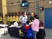 PBYR - Vance Harris, Gary Goldetsky and a Plymouth family at the PBYR booth at the Fire Department's open house on Oct 10, 2015