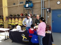 PBYR - Vance Harris, Gary Goldetsky and a Plymouth family at the PBYR booth at the Fire Department's open house on Oct 10, 2015